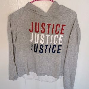Justice red, white, and blue sweatshirt.